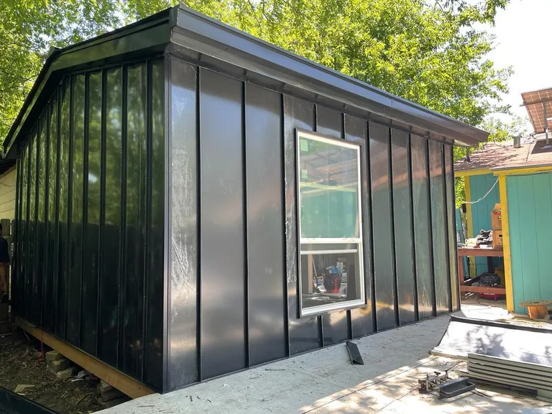 Black standing seam metal wall panels for Roof Inspection in Jefferson